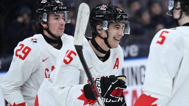 Canada's forward Matthew Poitras (C) reacts after scoring the 0-10 goal during the Group A ice hockey match between Latvia and Canada of the IIHF World Junior Championship in Gothenburg, Sweden on December 27, 2023.