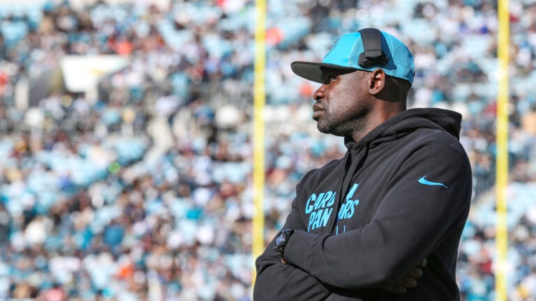 Carolina Panthers outside linebackers coach Tem Lukabu walks the sidelines before an NFL football game against the Jacksonville Jaguars, Sunday, Dec. 31, 2023, in Jacksonville, Fla.