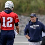 New England Patriots quarterback Tom Brady (12) and head coach Bill Belichick, right, speak during an NFL football practice, Wednesday, Sept. 18, 2019, in Foxborough, Mass. Six-time NFL champion Bill Belichick has agreed to part ways as the coach of the New England Patriots on Thursday, Jan. 11, 2024, bringing an end to his 24-year tenure as the architect of the most decorated dynasty of the league’s Super Bowl era, a person with knowledge of the situation told The Associated Press on the condition of anonymity because it has not yet been announced.