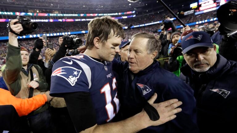 In this Jan. 21, 2018, file photo, New England Patriots quarterback Tom Brady, left, hugs coach Bill Belichick after the AFC championship NFL football game against the Jacksonville Jaguars, in Foxborough, Mass. Brady is an NFL free agent for the first time in his career. The 42-year-old quarterback with six Super Bowl rings said Tuesday morning, March 17, 2020, that he is leaving the New England Patriots.