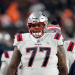 New England Patriots offensive tackle Trent Brown (77) in the first half of an NFL football game in Empower Field at Mile High Sunday, Dec. 24, 2023, in Denver.