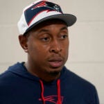 New England Patriots defensive line coach DeMarcus Covington faces reporters, Monday, Aug. 29, 2022, at the NFL football team's stadium, in Foxborough, Mass.