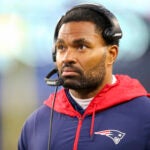 New England Patriots inside linebacker coach Jerod Mayo watches from the sideline during the second half of an NFL football game against the Jacksonville Jaguars, Sunday, Jan. 2, 2022, in Foxborough, Mass. Whether Bill Belichick’s future as the New England Patriots head coach will extend beyond this season remains an open question. But Jerod Mayo, one of the candidates to possibly succeed the legendary coach reiterated on Tuesday, Jan. 2, 2024 that he believes he’s ready for an opportunity to lead an NFL team.