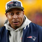 New England Patriots defensive line coach DeMarcus Covington stands on the sidelines before an NFL football game against the Pittsburgh Steelers Thursday, Dec. 7, 2023, in Pittsburgh.