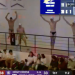 The Holy Cross swim team did what it could to distract the Terriers on Monday night.