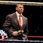 FILE - WWE chairman and CEO Vince McMahon speaks to an audience during a WWE fan appreciation event, Oct. 30, 2010, in Hartford, Conn.