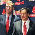 Boston MA 10-28-19: The Boston Red Sox introduced newly hired chief baseball officer Chaim Bloom (second from right) at a press conference in the The State Street Pavillion Club at Fenway Park. He is pictured as he and his new bosses (left to right) Sam Kennedy, Tom Werner and John Henry pose together for a photo following the event.