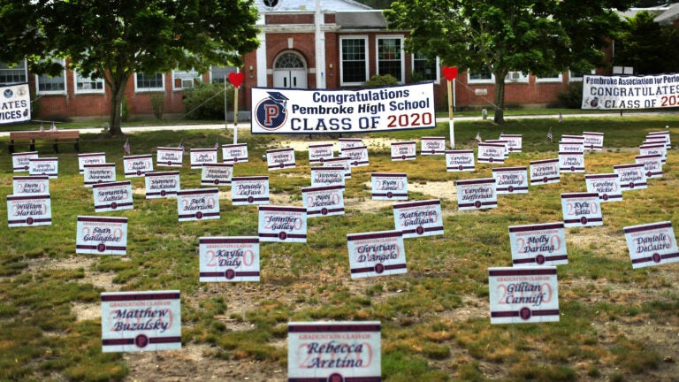 Signs displaying student names in the Town Green in Pembroke.