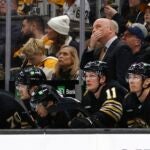 Bruins head coach Jim Montgomery looks up at the scoreboard during the third period.