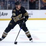 BOSTON, MASSACHUSETTS - OCTOBER 30: Matthew Poitras #51 of the Boston Bruins skates against the Florida Panthers during the first period at TD Garden on October 30, 2023 in Boston, Massachusetts.