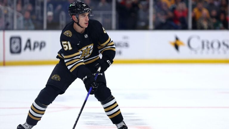 BOSTON, MASSACHUSETTS - OCTOBER 30: Matthew Poitras #51 of the Boston Bruins skates against the Florida Panthers during the first period at TD Garden on October 30, 2023 in Boston, Massachusetts.