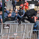 FILE - Law enforcement personnel clear the area around Union Station following a shooting at the Kansas City Chiefs Super Bowl celebration Feb. 14,