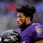 Baltimore Ravens cornerback Marlon Humphrey (44) warms up before an AFC Championship NFL football game between the Baltimore Ravens and the Kansas City Chiefs, Sunday, Jan. 28, 2024, in Baltimore.