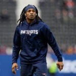 New England Patriots safety Kyle Dugger (23) warms up before an NFL football game between the New England Patriots and the Indianapolis Colts at Deutsche Bank Park Stadium in Frankfurt, Germany, Sunday, Nov. 12, 2023.