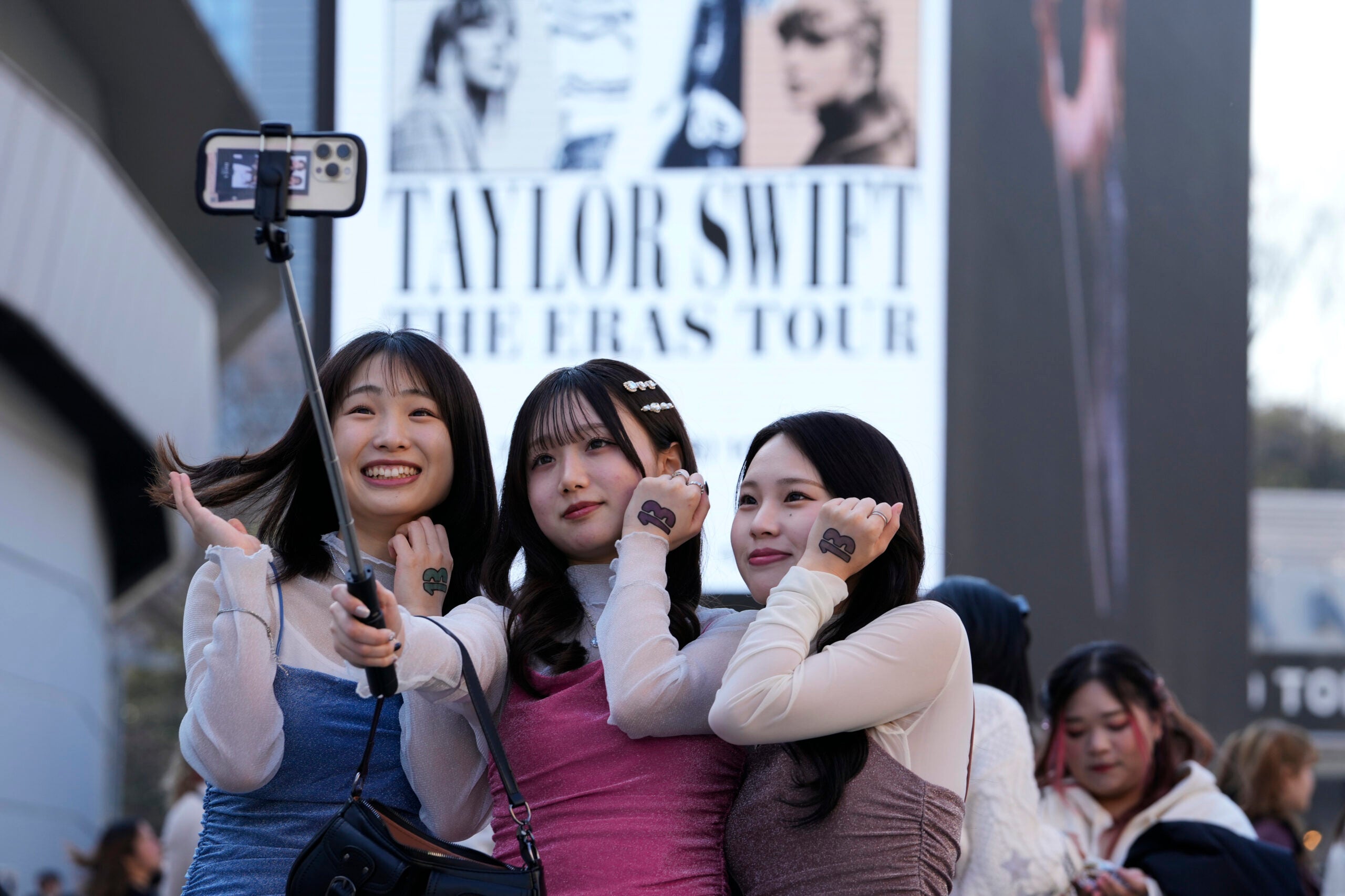 This is like our Super Bowl': Thousands of Taylor Swift fans line up for  merchandise