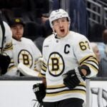 SEATTLE, WASHINGTON - FEBRUARY 26: Brad Marchand #63 of the Boston Bruins reacts during the third period Kraken at Climate Pledge Arena on February 26, 2024 in Seattle, Washington.