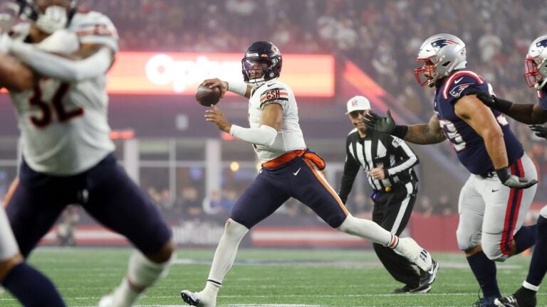 FOXBOROUGH, MASSACHUSETTS - OCTOBER 24: Justin Fields #1 of the Chicago Bears looks to pass during the first half against the New England Patriots at Gillette Stadium on October 24, 2022 in Foxborough, Massachusetts.