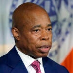 FILE - New York Mayor Eric Adams responds to questions during a news conference at New York's City Hall, Nov. 14, 2023.