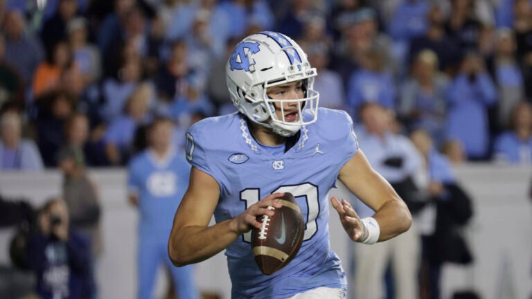 North Carolina quarterback Drake Maye (10) looks to pass during the first half an NCAA college football game against Virginia, Saturday, Oct. 21, 2023, in Chapel Hill, N.C.