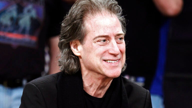 FILE - Comedian Richard Lewis attends an NBA basketball game in Los Angeles on Dec. 25, 2012.