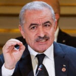 Palestinian Prime Minister Mohammed Shtayyeh speaks during a meeting.