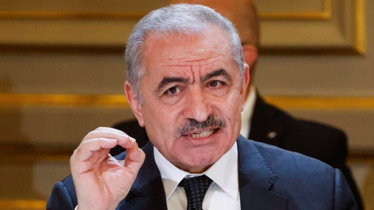 Palestinian Prime Minister Mohammed Shtayyeh speaks during a meeting.