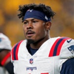 New England Patriots defensive back Jonathan Jones (31) warms up before an NFL football game against the Pittsburgh Steelers Thursday, Dec. 7, 2023, in Pittsburgh.