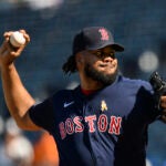 Boston Red Sox relief pitcher Kenley Jansen throws to a Kansas City Royals batter during the ninth inning of a baseball game, Sunday, Sept. 3, 2023, in Kansas City, Mo.