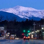 FILE - In this March 13, 2015 file photo, Mount Washington is seen at dawn from North Conway, New Hampshire.