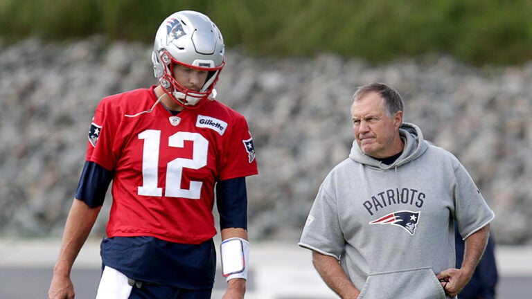 New England Patriots QB #12 Tom Brady (cq) left with Patriots head coach Bill Belichick (cq) right at