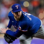 Texas Rangers pitcher Jordan Montgomery throws to a Houston Astros batter during Game 1 of the baseball American League Championship Series on Sunday, Oct. 15, 2023, in Houston.