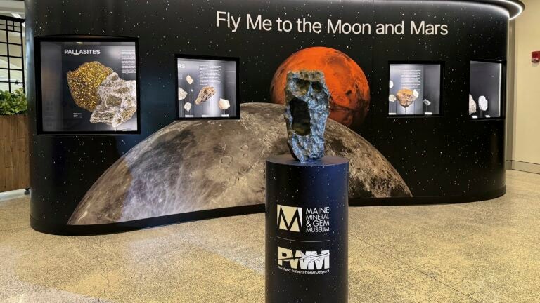 An installation at Portland International Jetport in Maine that features a large piece of the moon.