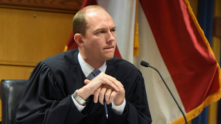 Judge Scott McAfee addresses the lawyers during a hearing in Atlanta.