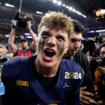 Michigan quarterback J.J. McCarthy celebrates after their win in the national championship NCAA College Football Playoff game against Washington Monday, Jan. 8, 2024, in Houston.