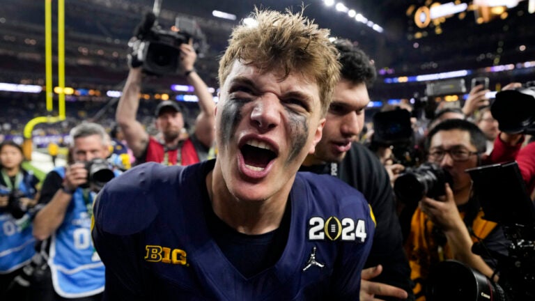 Michigan quarterback J.J. McCarthy celebrates after their win in the national championship NCAA College Football Playoff game against Washington Monday, Jan. 8, 2024, in Houston.