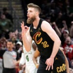 Cleveland Cavaliers forward Dean Wade celebrates a three point basket in the second half against the Celtics.