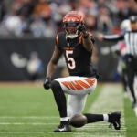 Cincinnati Bengals wide receiver Tee Higgins (5) gives the first down indication after his catch during an NFL football game against the Indianapolis Colts, Sunday, Dec. 10, 2023, in Cincinnati, OH.