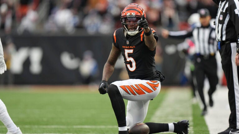 Cincinnati Bengals wide receiver Tee Higgins (5) gives the first down indication after his catch during an NFL football game against the Indianapolis Colts, Sunday, Dec. 10, 2023, in Cincinnati, OH.