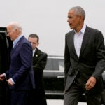President Joe Biden, left, and former President Barack Obama, right, arrive at John F. Kennedy International Airport, Thursday, March 28, 2024, in New York.