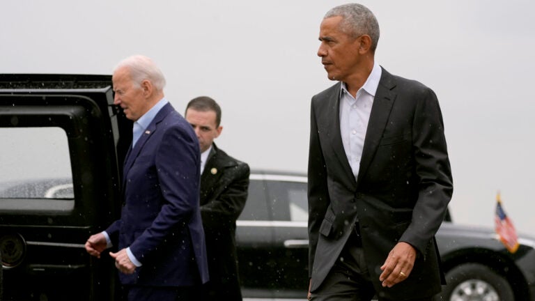 President Joe Biden, left, and former President Barack Obama, right, arrive at John F. Kennedy International Airport, Thursday, March 28, 2024, in New York.