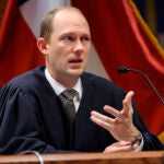 Fulton County Superior Judge Scott McAfee presides in court, Friday, March, 1, 2024, in Atlanta.