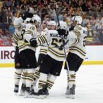 SUNRISE, FLORIDA - MARCH 26: The Boston Bruins celebrate the game-winning goal by Pavel Zacha #18 against the Florida Panthers at Amerant Bank Arena on March 26, 2024 in Sunrise, Florida.