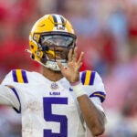 LSU quarterback Jayden Daniels (5) during the first half of an NCAA football game on Saturday, Sept. 30, 2023, in Oxford, Miss.