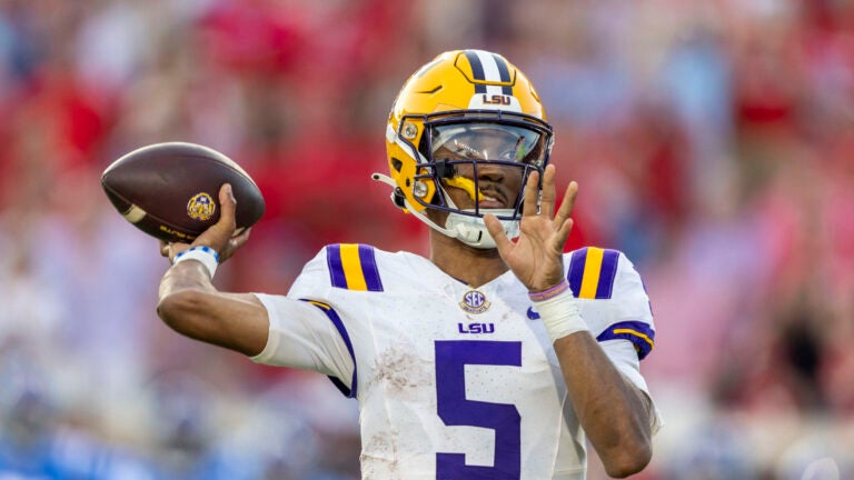 LSU quarterback Jayden Daniels (5) during the first half of an NCAA football game on Saturday, Sept. 30, 2023, in Oxford, Miss.