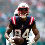 New England Patriots wide receiver Kendrick Bourne runs to score a touchdown during the first half of an NFL football game against the Miami Dolphins, Sunday, Oct. 29, 2023, in Miami Gardens, Fla.