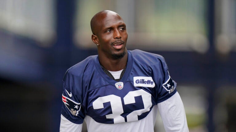 New England Patriots free safety Devin McCourty arrives at an NFL football practice, Wednesday, Aug. 4, 2021, in Foxborough, Mass.