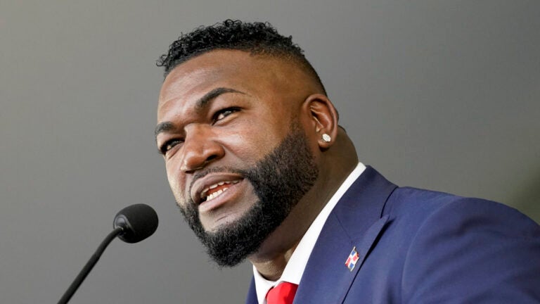 Hall of Fame inductee David Ortiz speaks during the National Baseball Hall of Fame induction ceremony, Sunday, July 24, 2022, in Cooperstown, N.Y. Ortiz has watched his former team, the Boston Red Sox, stumble to consecutive last-place finishes in three of the past four seasons. Now he believes his old teammate and recently hired Chief Baseball Officer, Craig Breslow, can turn things around.