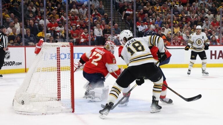 Pavel Zacha of the Bruins scores the game-winning goal at 17:39 of the third period on an assist from David Pastrnak against Sergei Bobrovsky of the Florida Panthers at Amerant Bank Arena on March 26, 2024 in Sunrise, Florida.