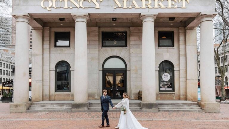 Alec and Sophia Fowler at Quincy Market on their wedding day