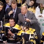 Bruins LW Brad Marchand #63 and head coach Claude Julien have words for an official during the 2nd period. The Boston Bruins play the Carolina Hurricanes during a regular season NHL hockey game at the TD Garden in Boston, MA on Thursday, February 2, 2012.